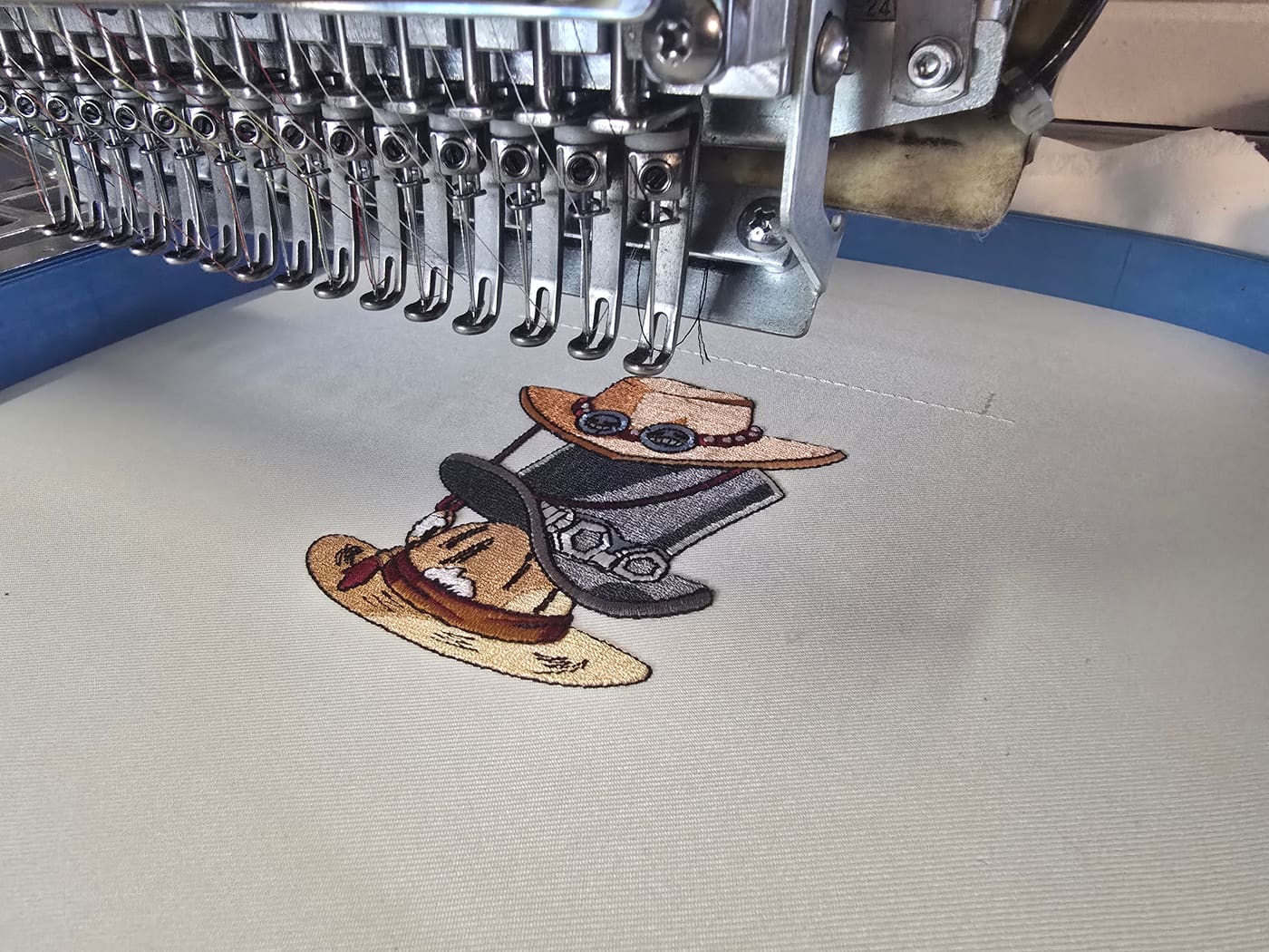 Embroidery machine running a fan-art piece